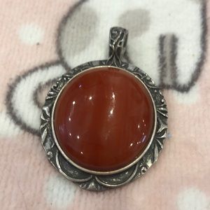 Coral Pendant set in silver tone